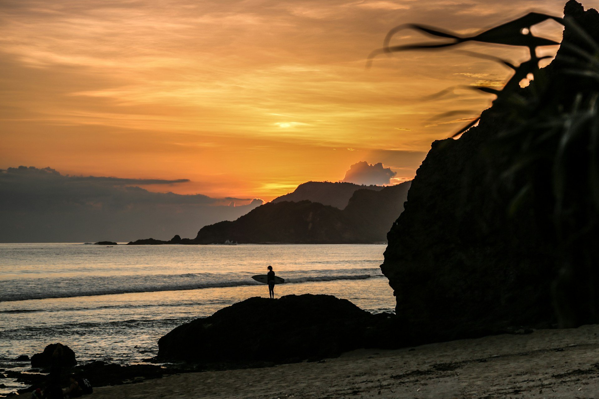 Sunset over Lombok's dramatic coastline. Photo: Julie Romaniuk