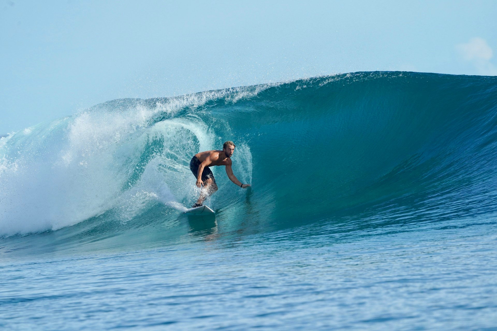Riding a clean Mentawai wave. Photo: Keaton Dickinson
